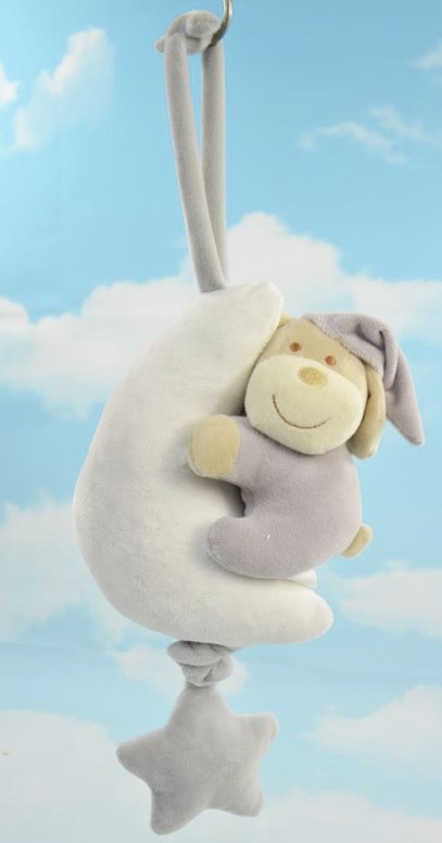 Berceuse, chien en peluche sur lune